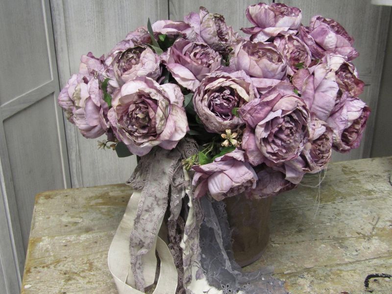 Floral arrangement centerpiece wilted look faded plum peonies in an antique canvas bucket, handmade distressed home decor anita spero design