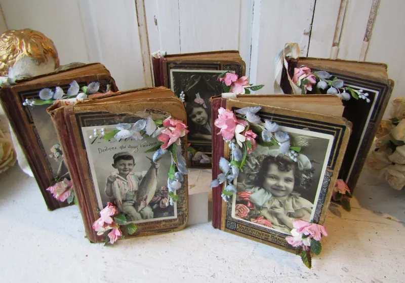 Embellished antique book set wall or table decor, old books embellished with tinted French postcards and flowers anita spero design