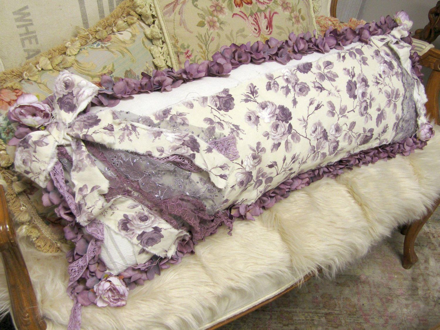 Long lumbar pillow embellished with flowers, bows, fabric lace in plum faded purple heather romantic pillows Anita Spero design