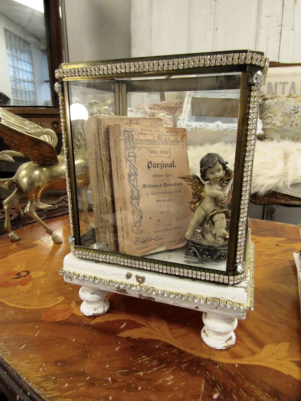 Glass and metal display case with wood riser base, doll style showcase embellished in rhinestone trim anita spero design