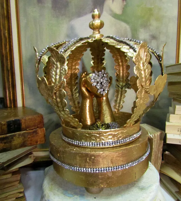 Golden sculpture hands with sacred heart under a crown dome and base, religious Santos symbol one of a kind decor Anita Spero Design