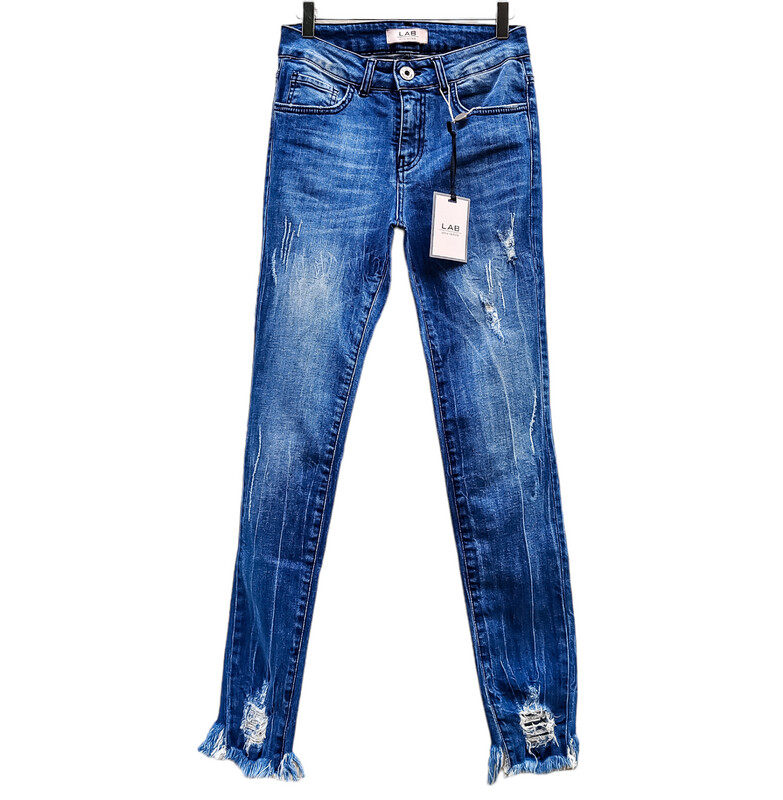 Slim Jeans for Women in Medium Blue with Ankle Distressing and Fringes