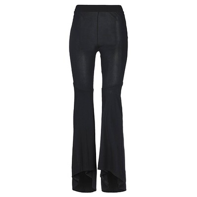 Women&#39;s black flared leggings with asymmetrical ruffle at the hem