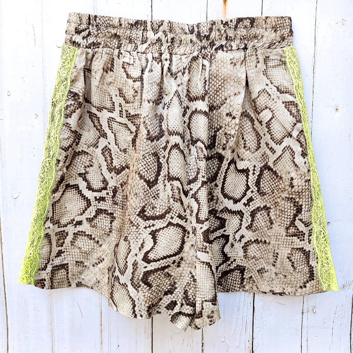 Women&#39;s satin python print shorts with lace