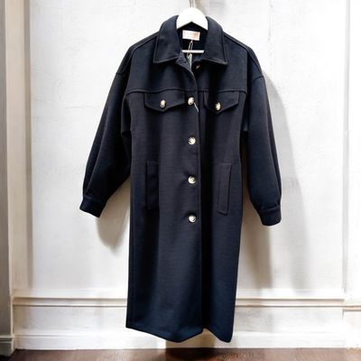 Manteau en laine noir femme, col classique, manches bouffantes et fermeture par boutons