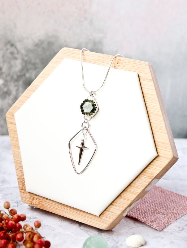 Celestial moss agate pendant in sterling silver with hanging star.
