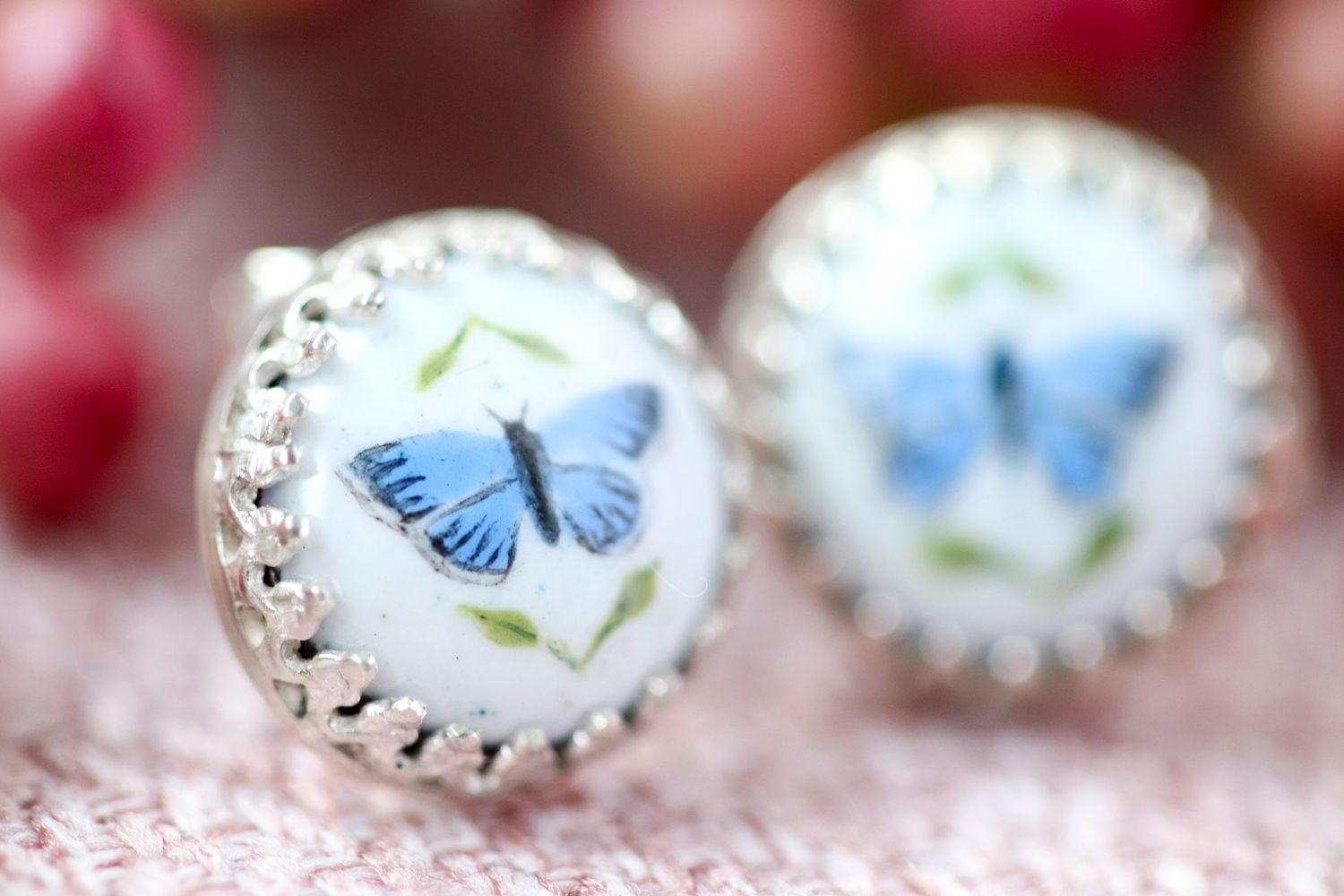 Silver and enamel stud earrings with holly blue butterflies