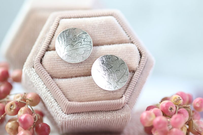 Oak leaf textured earrings in sterling silver.