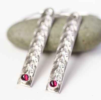 Garnet and silver leaf and berry drop earrings.