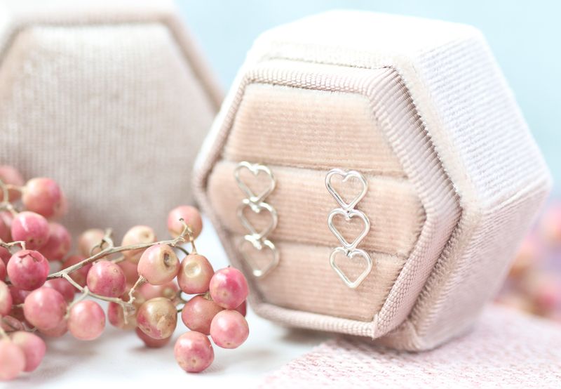 Triple heart sterling silver studs.