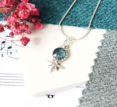 Celestial sterling silver and kyanite pendant.