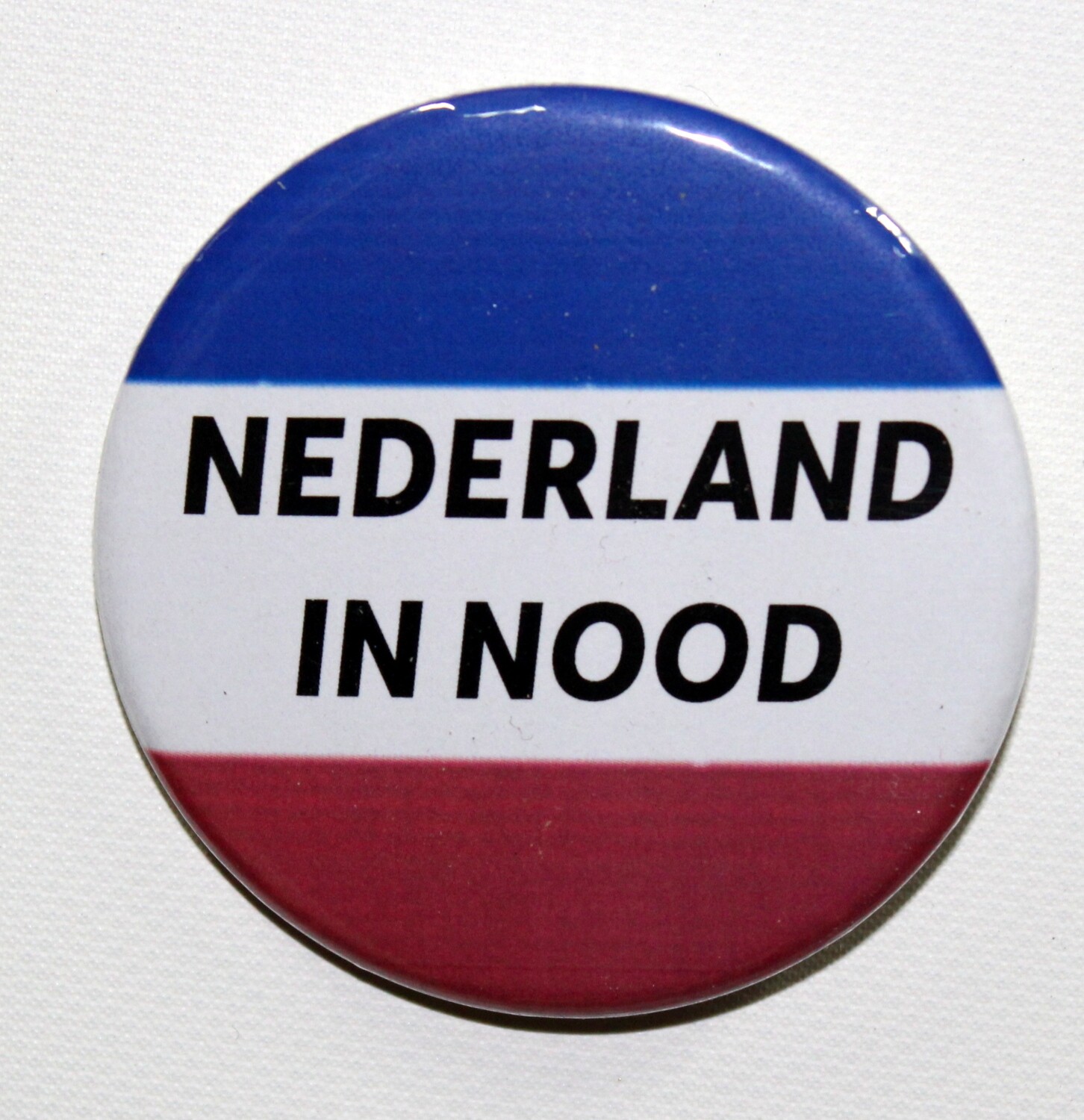Button NEDERLAND IN NOOD