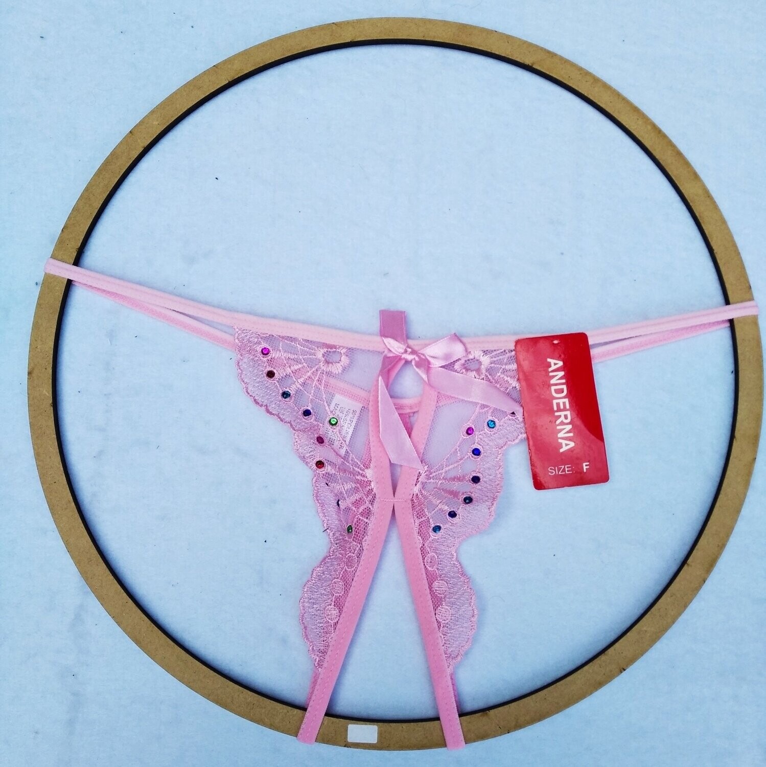 TANGA ABIERTA