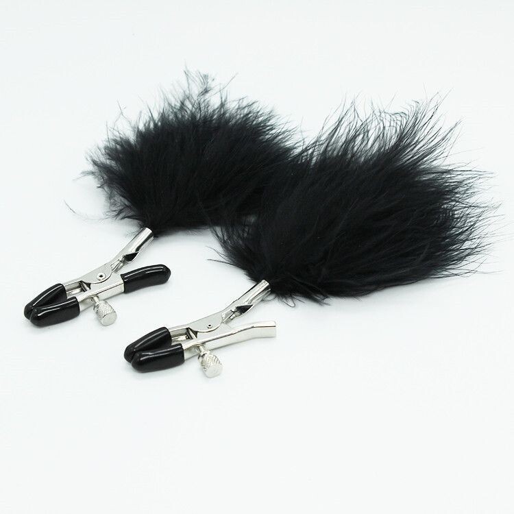 Pinzas para pezones con plumas