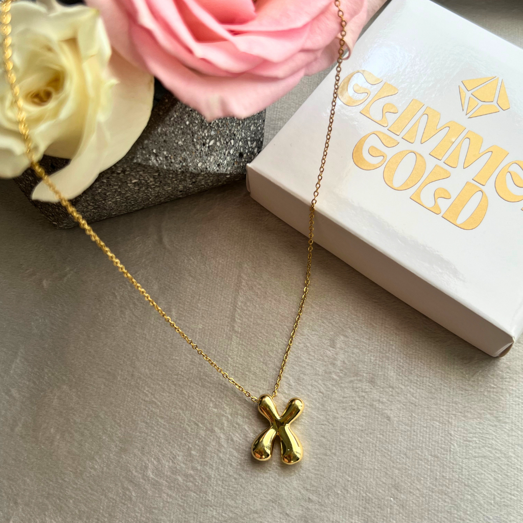 Collar de letra "X"