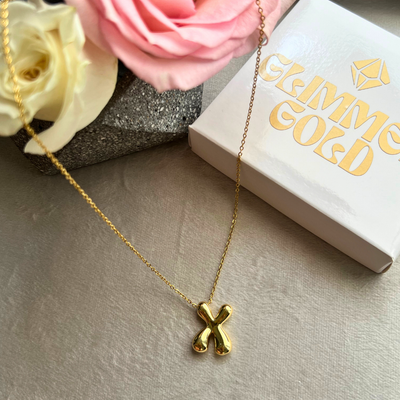 Collar de letra "X"