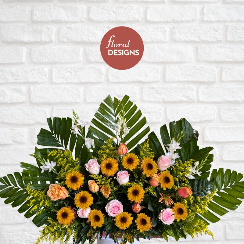 Palmatoria de rosas y gerberas