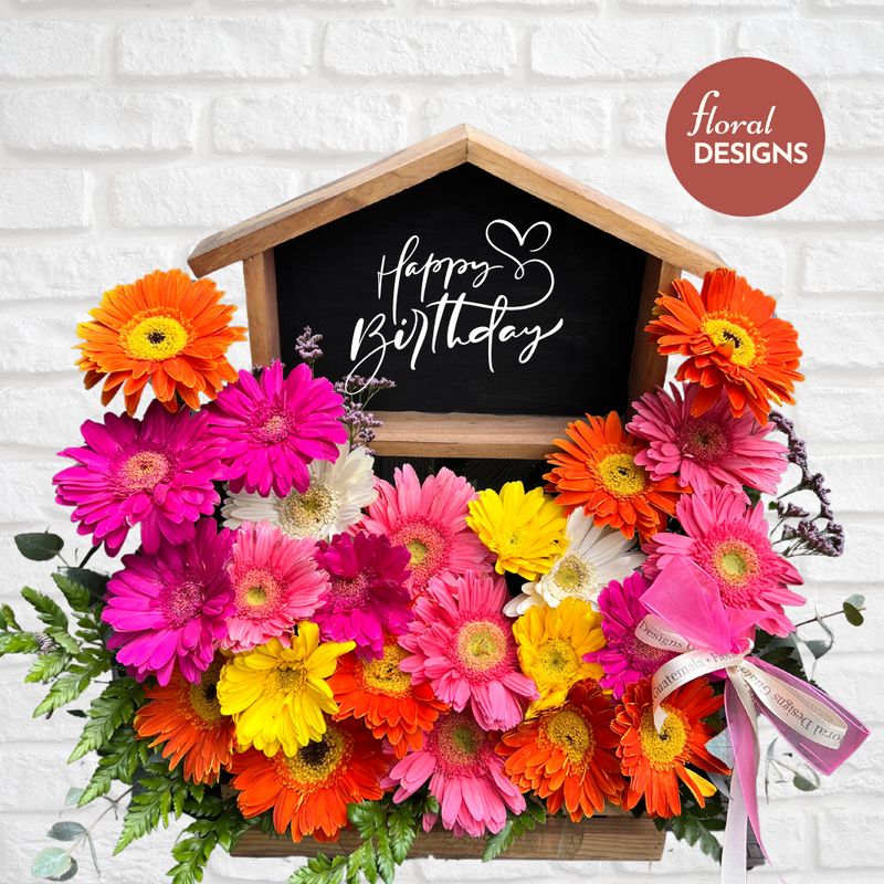 Casita de gerberas