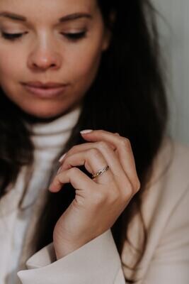 De symbolische betekenis van een gouden as ring