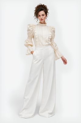 Creme blouse with puffy sleeves