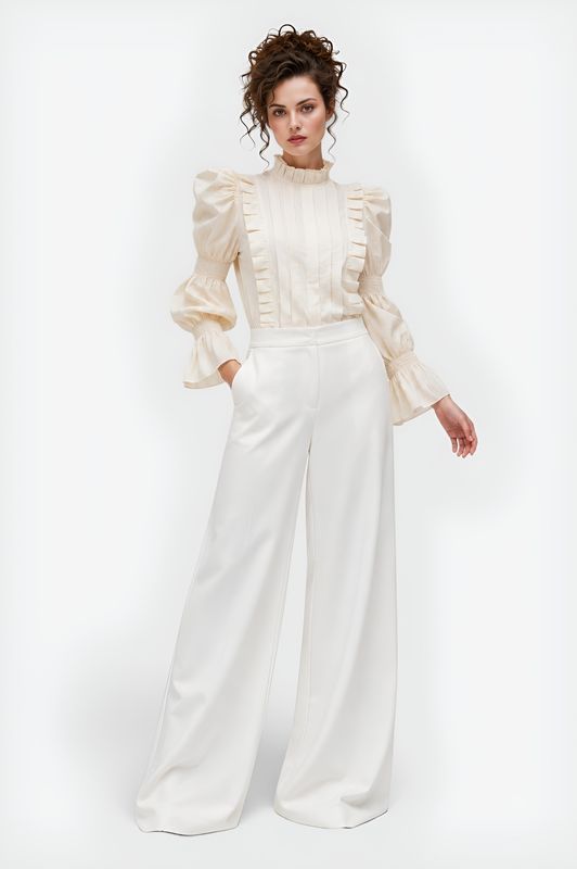 Creme blouse with puffy sleeves