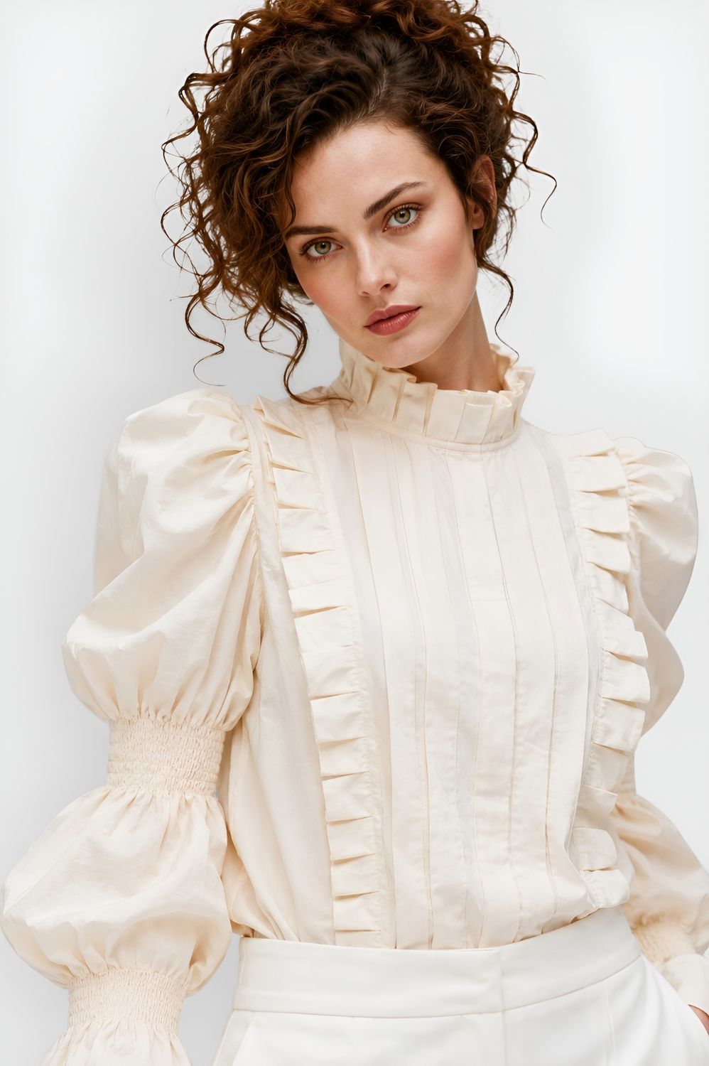 Creme blouse with puffy sleeves