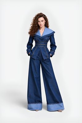 Blue denim jacket with zippers and separated belt