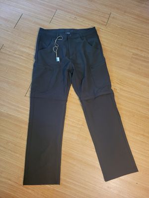 NEW - black water repellent hiking pants LG with pockets &amp; zip offs (at knee area) Purchased in Norway.