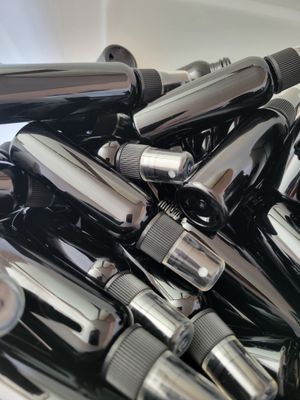 Bottle PET Boston Round Black 2 ozs  with fine mist were $ 3.50 each