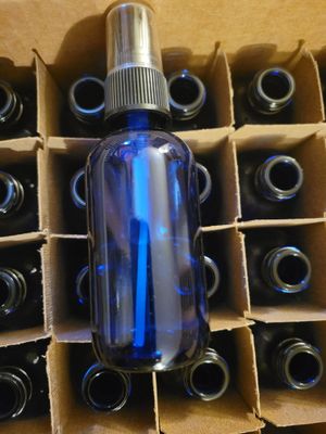 Bottle Blue Glass with Black Mist top (2 ozs) were $5.50 each