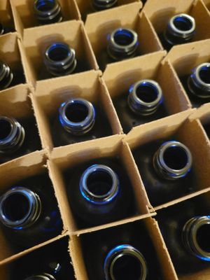 Bottle Blue Glass with Black Mist top (2 ozs) were $5.50 each