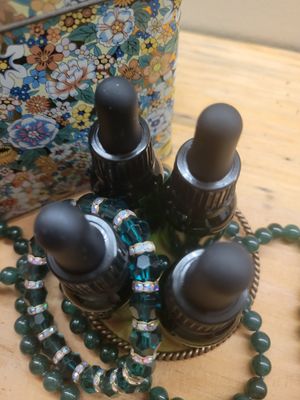 Essential Oil Blend / Heart Chakra Blend- Fractionated Coconut Oil. 15mls. Green Glass with Dropper.