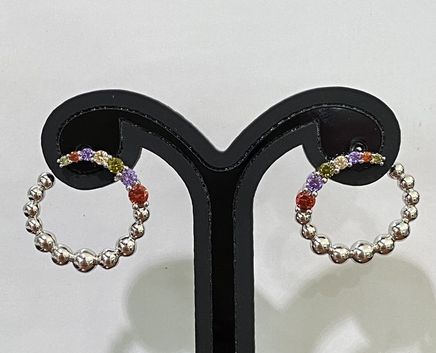 Aretes de bolitas de colores