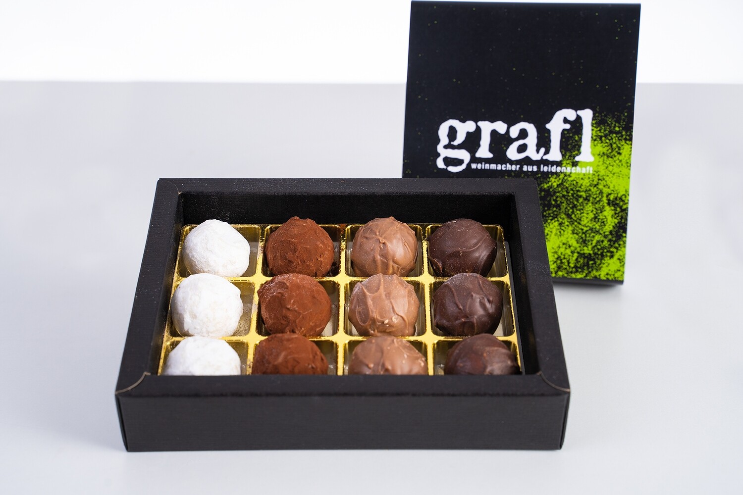12 Pralinen nach Wahl in der Geschenkverpackung