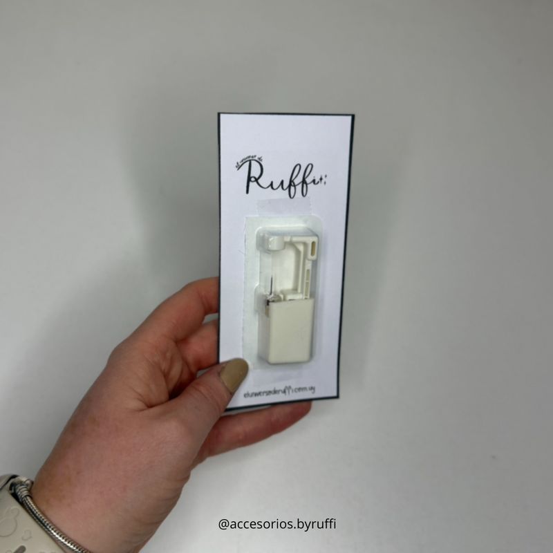 Perforadora con abridor