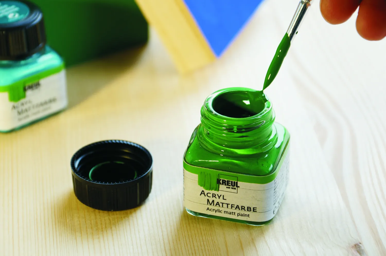 KREUL acrylic matt green paint jar with brush showing creamy matte texture