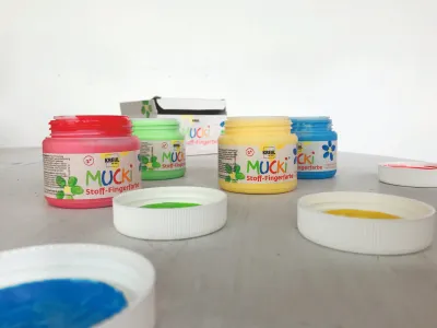 MUCKI finger paint fabric set in yellow, red, blue and green