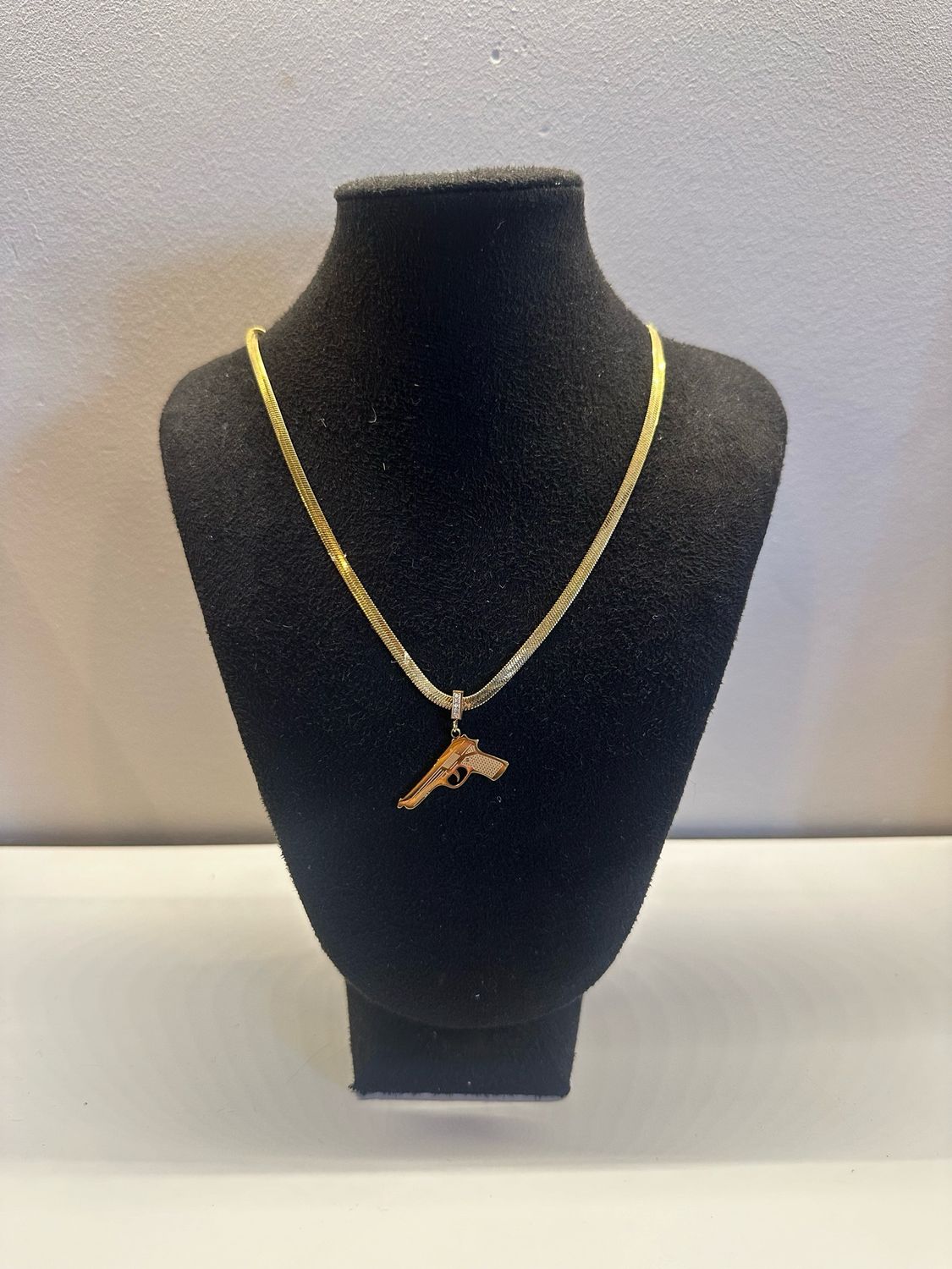 KETTING PISTOOLBEDEL | GOUD