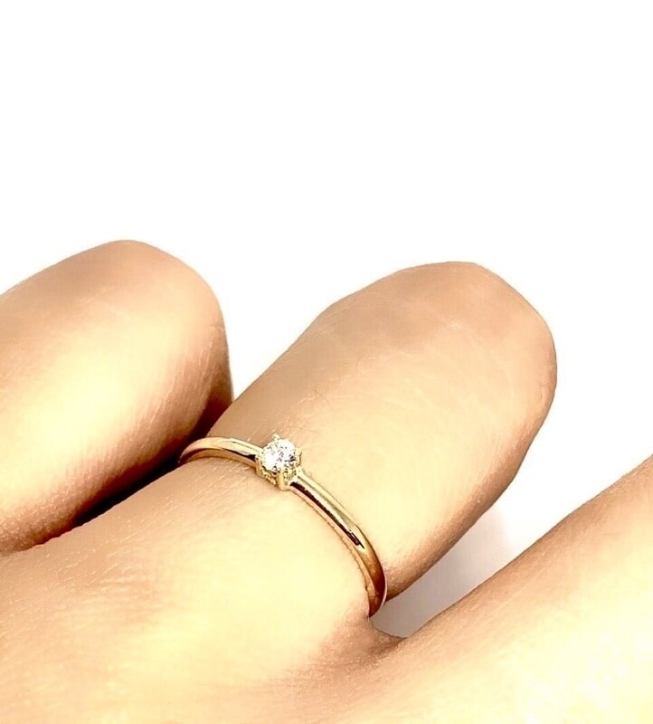 Four Prongs 0.08 ct Diamond Ring