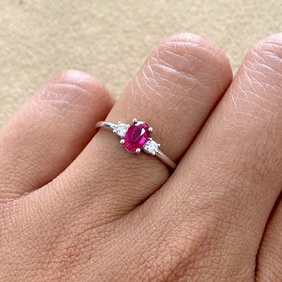Oval Shaped 0.5 ct Ruby, Trilogy Diamond Ring