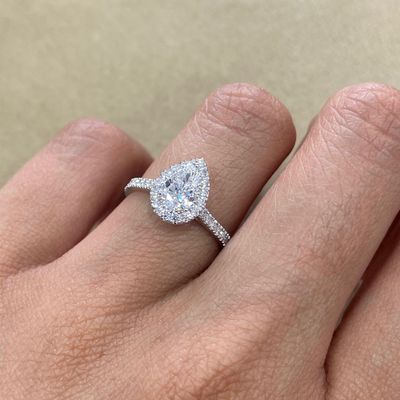 GIA Certified, Emerald Cut 0.63 ct, Halo Style Diamond Engagement Ring