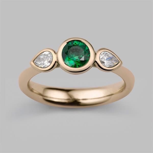 Trinity Style 0.5 Ct Round Emerald, Pear Shaped Diamonds Ring