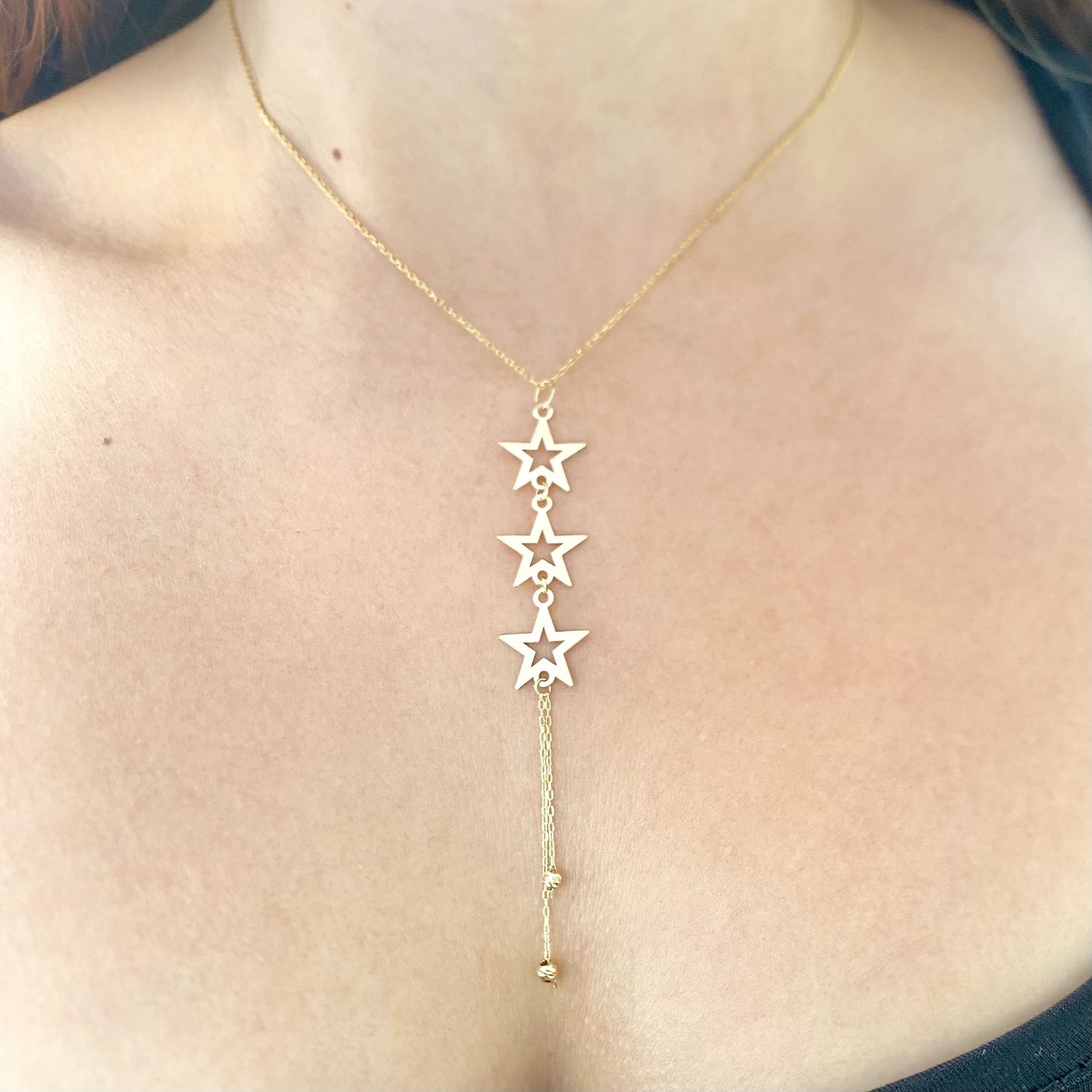 Medium Size Dangling Multi Star Necklace