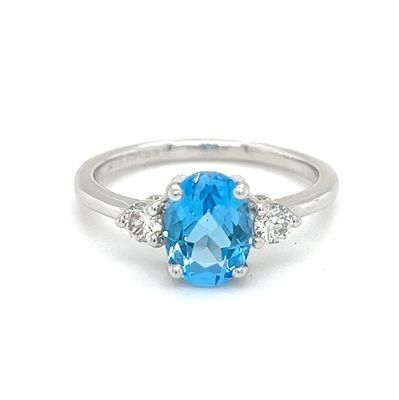 Oval 1.5 ct Blue Topaz and Diamond Ring