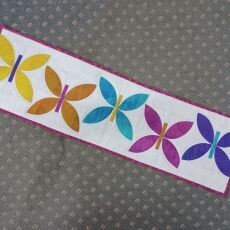 Wonder Curve Ruler Class -  Wonder Flutters table runner May 9, 2025