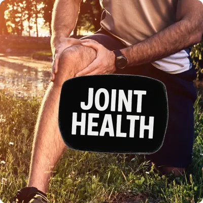 Man holding knee outdoors with Joint Health text, featuring Natural Body joint support supplements for mobility and recovery.