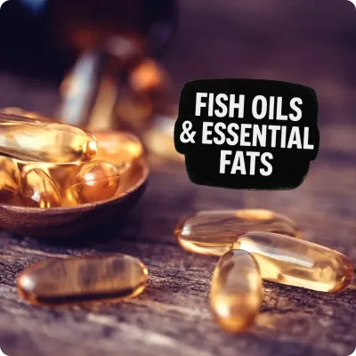 Fish oil capsules on wooden table with Fish Oils &amp; Essential Fats text, highlighting a selection of fish oil supplements.