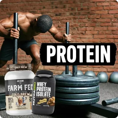 Athlete pushing sled with protein tubs in front, highlighting protein powders for recovery and lean muscle.