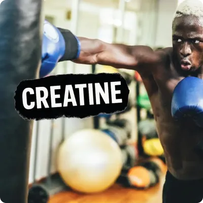 Athlete boxing with focus in gym and Creatine text, featuring creatine supplements for strength and performance.