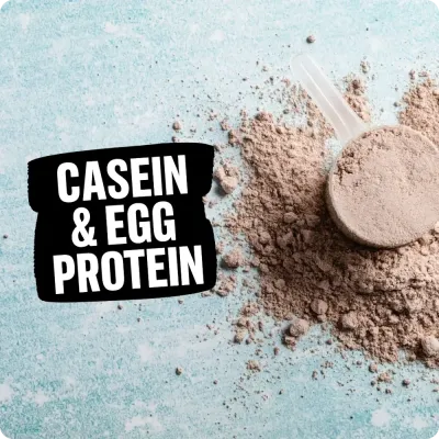 Scoop of casein protein powder with Casein &amp; Egg Protein text, highlighting Natural Body’s selection of protein supplements.